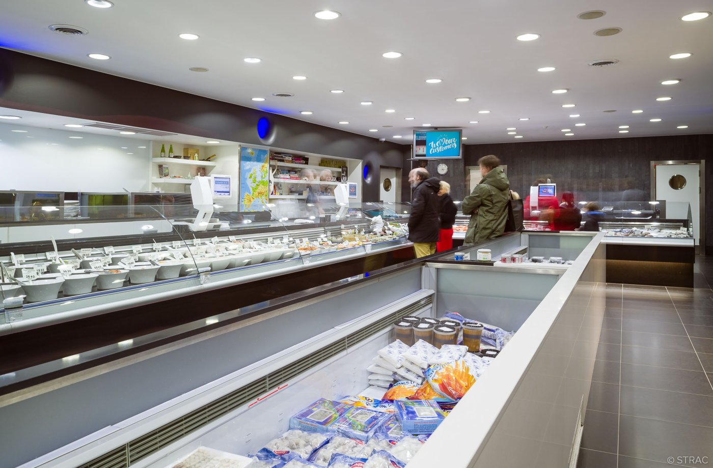 Afwerking winkelinrichting De Vis in Gent door Strac