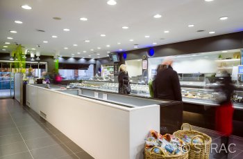 Afwerking winkelinrichting De Vis in Gent door Strac