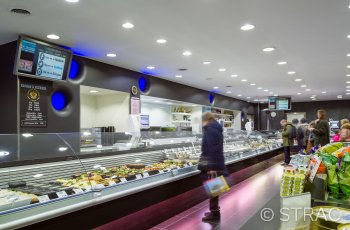 Afwerking winkelinrichting De Vis in Gent door Strac